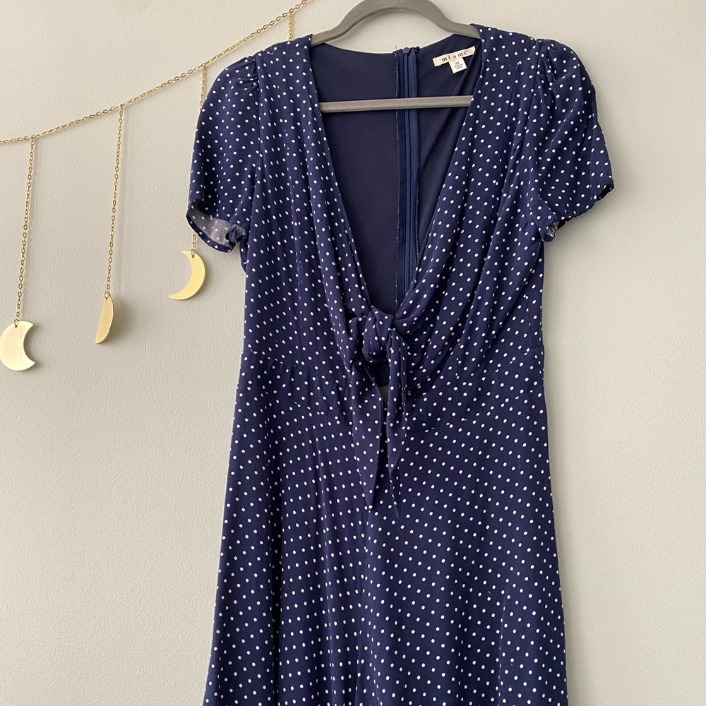 navy blue & white polka dot flowy romper